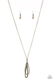 Step Into the Spotlight - Pink - Brass Encrusted Teardrop Interlocks Long Necklace