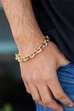 Step It Up - Gold Chunky Links Urban Clasp Bracelet