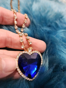 Heart Necklace - Blue Gem Nestled Inside a Gold Heart Frame with White Rhinestones Short Necklace