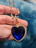 Heart Necklace - Blue Gem Nestled Inside a Gold Heart Frame with White Rhinestones Short Necklace