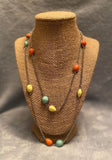 Pacific Piers - Multicolored - Green - Red Assorted Sizes Round and Teardrop Shapes Long Necklace